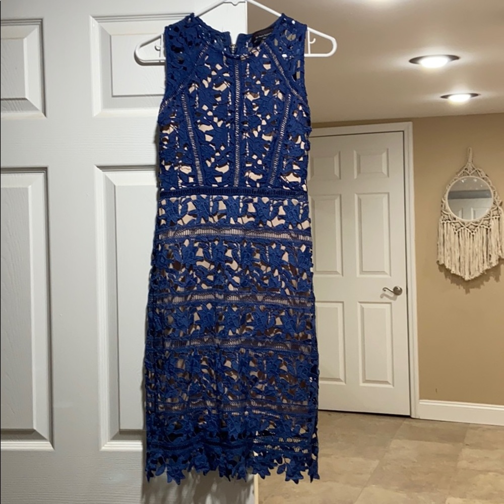 Knee length beige and blue lace dress